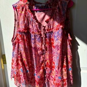 Filmy sleeveless tunic with stretchy underlayer